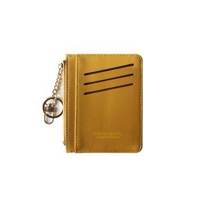 Bright yellow multi-slot leather card holder with metal zipper and key hook on white background