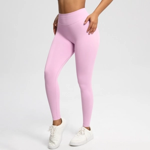 Detailaufnahme der rosa nahtlosen Yoga-Leggings mit hoher Taille und geripptem Taillenbund