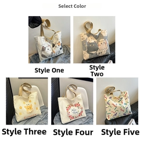 Detail view of printed canvas tote bags with various patterns and durable brown handles
