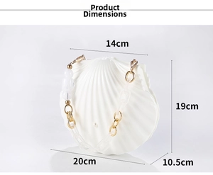 Detail view of white shell-shaped acrylic handbag with specific dimensions and gold chain
