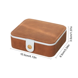 Mini tan faux leather jewelry box with dimensions 10.5x8.5x3.5cm for rings and earrings