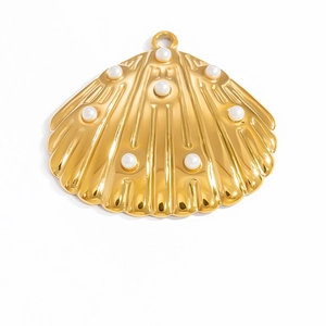 Detailed view of a golden shell pendant featuring elegant white pearl embellishments
