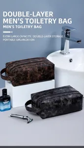 Primer plano de neceseres de doble capa en cuero PU marrón y negro para viajes