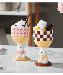 Detail of creative ceramic dessert cups featuring hand-painted bear bases and plaid patterns