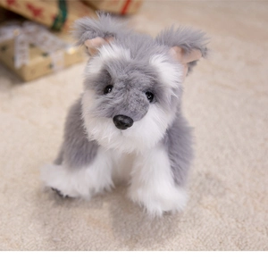 Close-up of realistic Schnauzer plush toy with soft gray and white faux fur texture