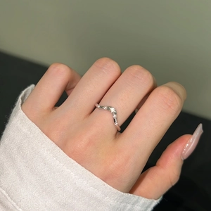 Detailed view of an elegant S925 sterling silver V-shaped ring with pavé zircon settings