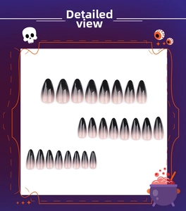 Close-up of black and pink gradient almond shape fake nails for Halloween decoration