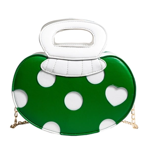 Cute green polka dot apple-shaped crossbody bag with heart pattern and white top handle