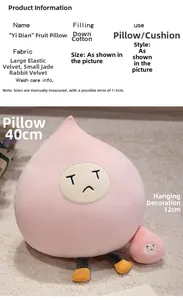 Detail of peach plush pillow and small keychain set with cute expressions and soft texture