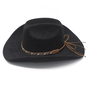 Close-up of black faux suede cowboy hat with beaded leather strap and tassel accents