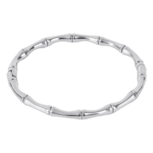 Detailed close-up of polished silver bamboo style stainless steel adjustable cuff bracelet