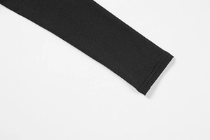 Close-up of double-needle stitching on black elastic knitted dress sleeve cuffs