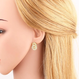 Elegant gold-plated double hoop earrings with twisted metal and cubic zirconia details