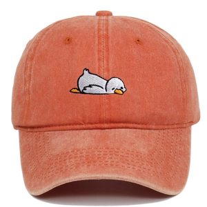 Close-up of the cartoon duck embroidery on this washed cotton baseball cap fabric