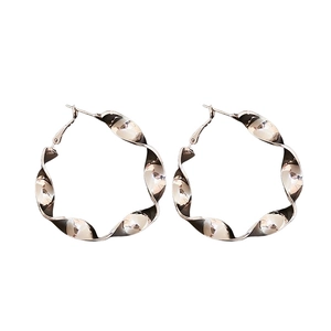Polished silver spiral twist hoop earrings with a minimalist geometric metal design
