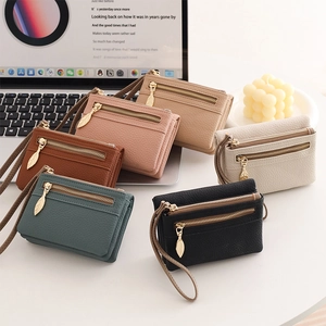 Short PU leather wallets for women with leaf zippers and wristlets in multiple colors
