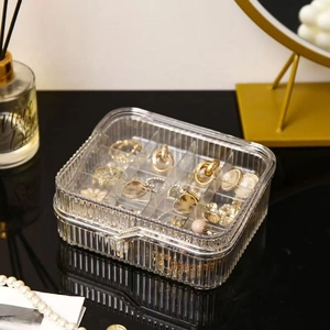 Transparent acrylic jewelry box with striped texture and dividers for earrings and rings