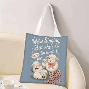 Sac cabas en toile bleue avec motif mouton dessin animé sur un canapé, grand sac épaule