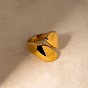 Polished 18k gold plated stainless steel asymmetrical open ring with pebble design