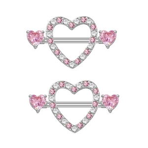 Detail of pink and clear zircon heart nipple rings with silver stainless steel bar