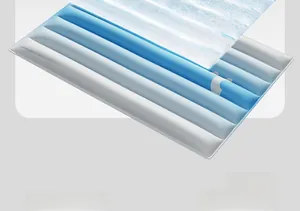 Detail of pet cooling mat showing blue striped texture and inner cool sense gel layer