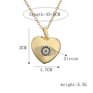 Detail view of heart evil eye pendant with 45+5cm chain length and zircon stone specs