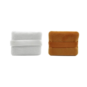 Soft square velvet makeup puffs in white and brown with ribbon handles for powder