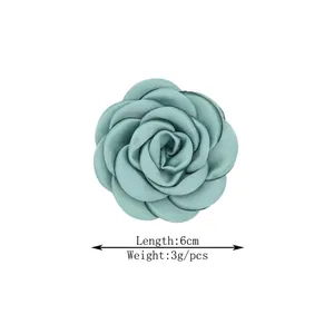 Handmade light teal satin camellia flower decoration with 6cm diameter and 3g weight