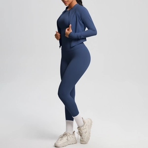 Detail of navy blue brushed athletic 3-piece set with long sleeve jacket and leggings