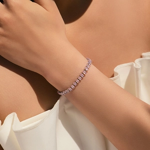 Close-up of Bohemian 18K gold plated bracelet with sparkling pink marquise-cut zircons