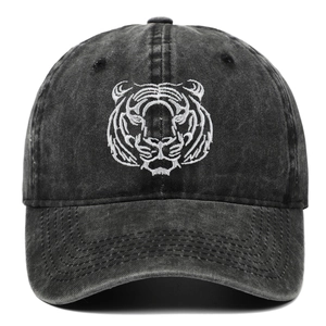 Close-up of high-density white tiger embroidery on washed grey cotton baseball cap