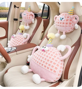 Pink cartoon monster car headrest and lumbar support set on leather seats