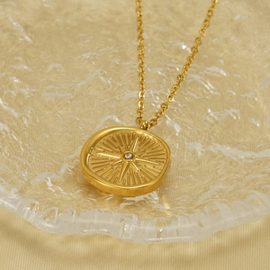 18K gold plated stainless steel necklace with sparkling North Star compass pendant