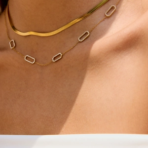 Classic 18K gold plated stainless steel layered necklace with a white diamond oval pendant