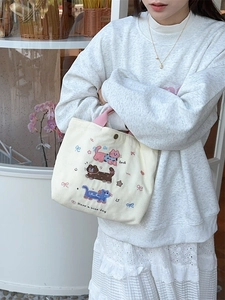 Borsa in velluto a coste con ricamo a gatto, manici rosa e chiusura con bottone