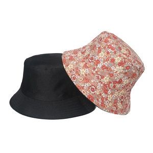 Cotton bucket hat set with minimalist black and vibrant floral print patterns for sun protection