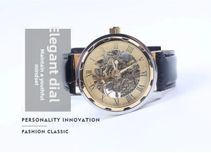 Detail of hollow automatic mechanical watch with visible gears and silver polished case
