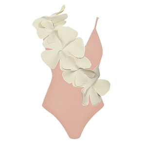 Detail of dusty pink one-piece swimsuit with white 3D floral appliques and V-neckline