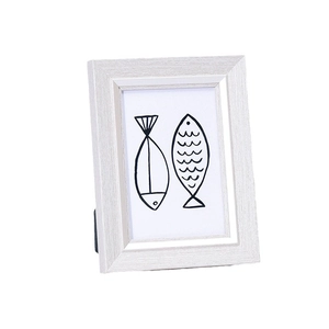 Nordic white wood grain photo frame with modern minimalist fish line art on white background
