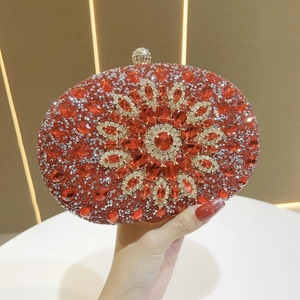 Macro detail of luxury red sunflower evening clutch with intricate crystal rhinestones