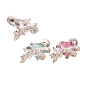 Bow heart titanium steel stud earrings with clear, blue, and pink gems in studio light