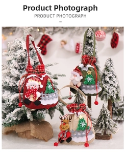 Detailed view of Christmas burlap gift bags with 3D Santa, Snowman and Reindeer dolls