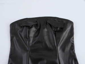 Close-up of black PU leather strapless bustier featuring decorative pockets and stitching