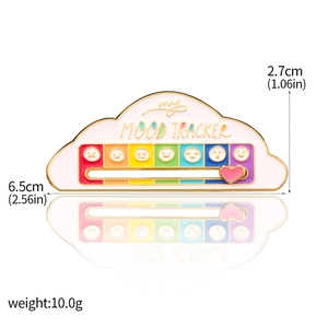 Macro view of cloud mood tracker enamel pin showing dimensions 6.5cm x 2.7cm and weight