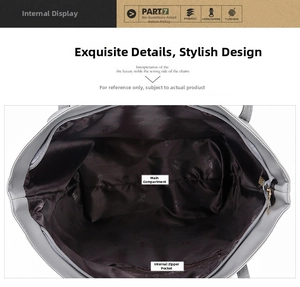 Internal view of tote bag featuring a spacious main compartment and zippered side pocket