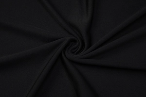 Nahaufnahme von schwarzem Strickstoff mit feiner Rippstruktur für ein Kleid