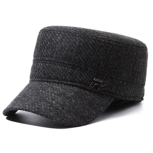 Men's wool flat top army cap in dark grey tweed with metal R detail on a white background