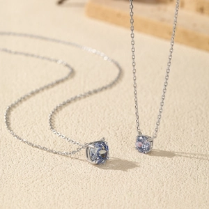 S925 sterling silver necklace featuring square-cut tanzanite blue gems in a four-claw setting