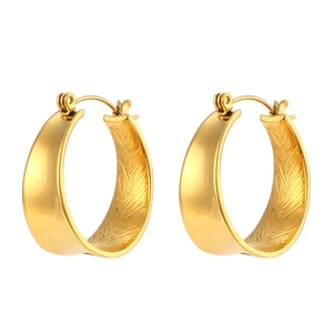 Pair of stylish thick C-shaped gold hoop earrings featuring a glossy metallic finish