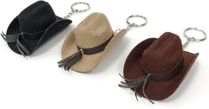 Close-up of three 8cm mini felt cowboy hat keychains in black, light brown, and dark brown